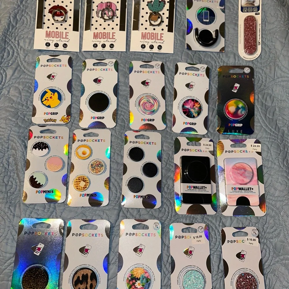 12 Brand New Popsockets. Each one is priced differently
